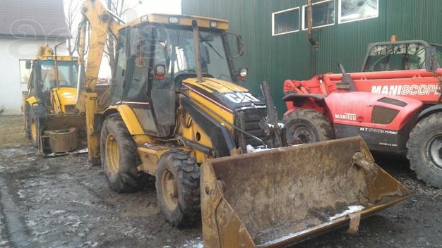 Продам экскаватор погрузчик Caterpillar 424